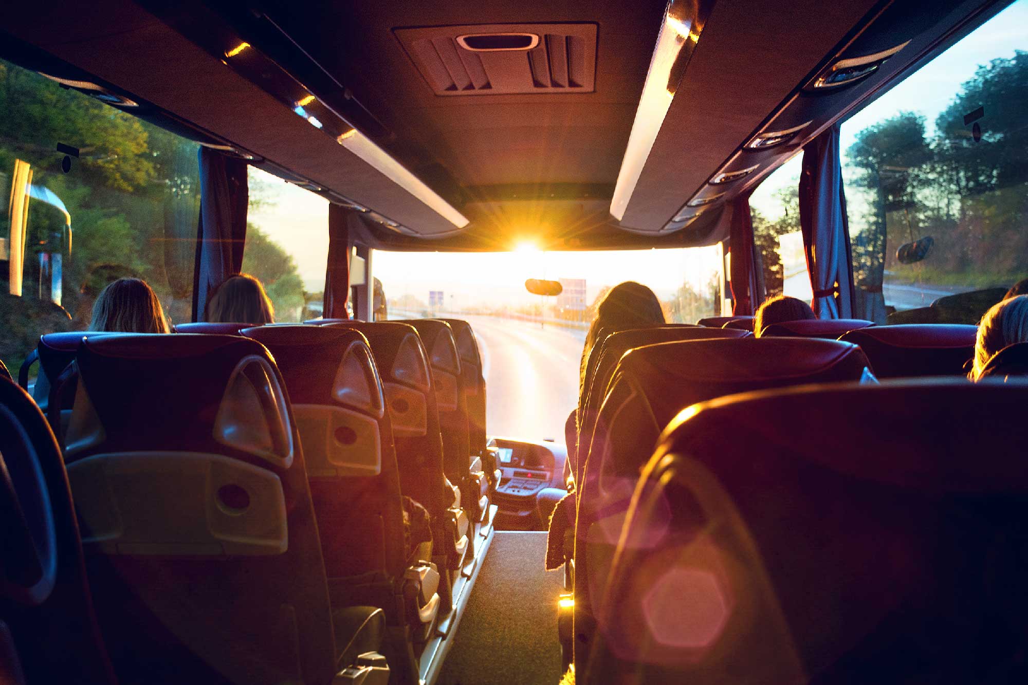 Passengers seated on a New York Bus Company coach